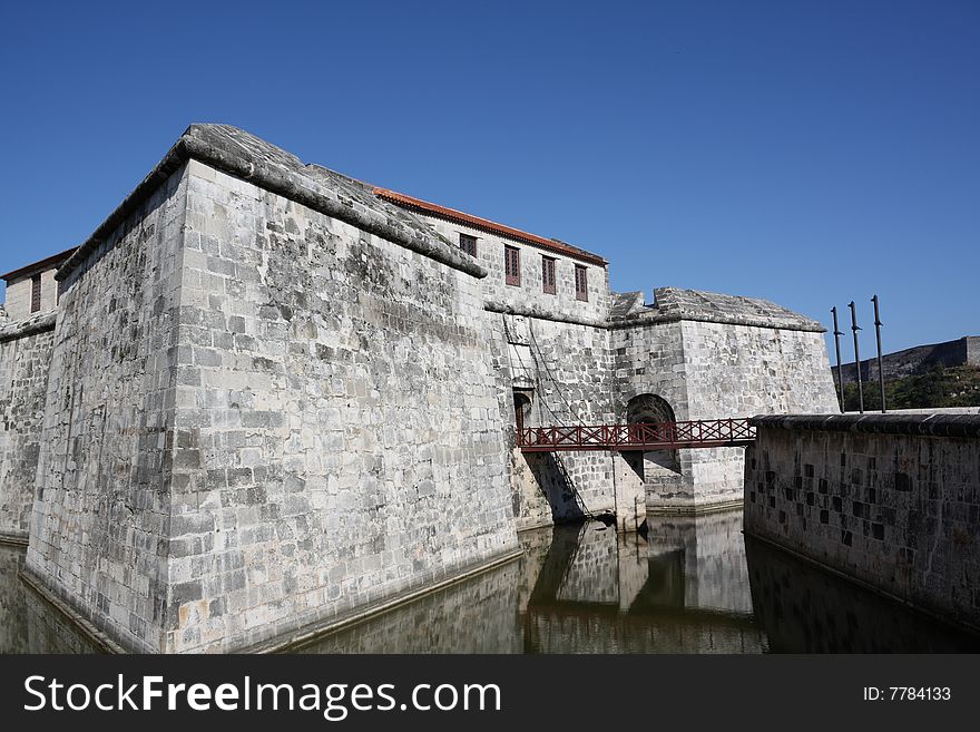 The Castle of Force entrance with a wooden bridge