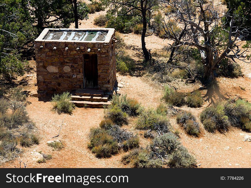 Small stone shack in the middle of rural area