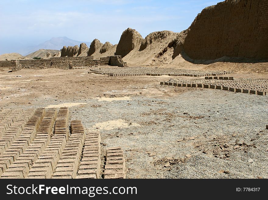 Bricks made of mud and sand are drying in the desert of Peru. Bricks made of mud and sand are drying in the desert of Peru