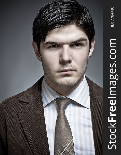 Dynamic image of a handsome young man shot in studio. Dynamic image of a handsome young man shot in studio