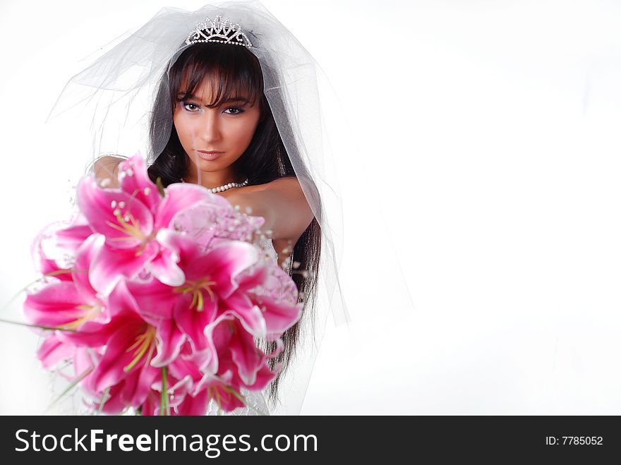 Young bride with bouquet of lilys on a white background