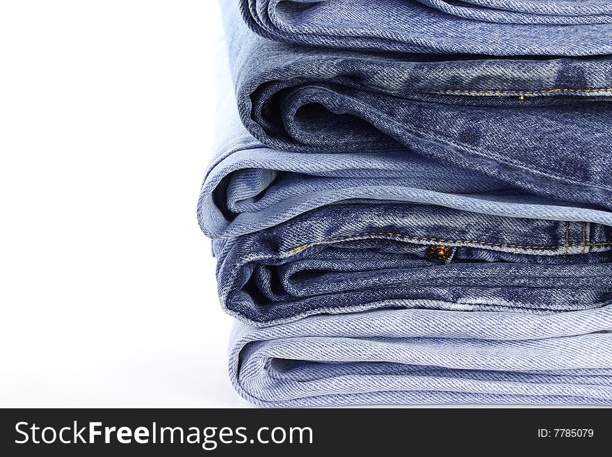 A pile of jeans isolated