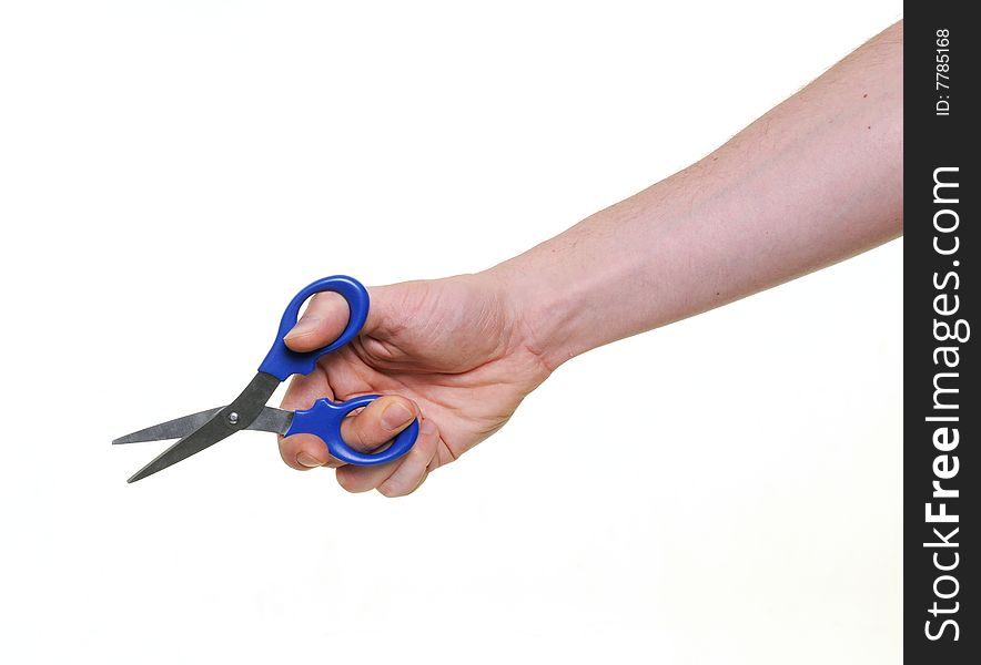 Hand holding scissors on white background