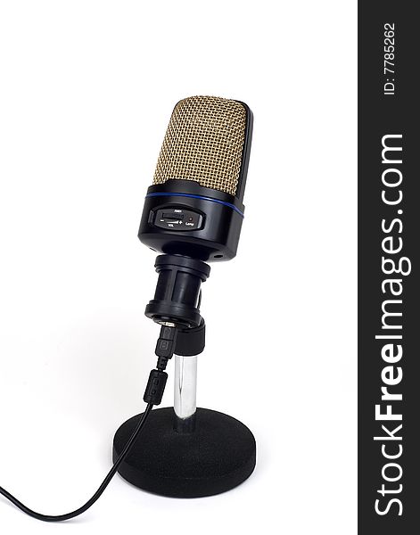 A large-diaphragm microphone on a stand with cable. A large-diaphragm microphone on a stand with cable