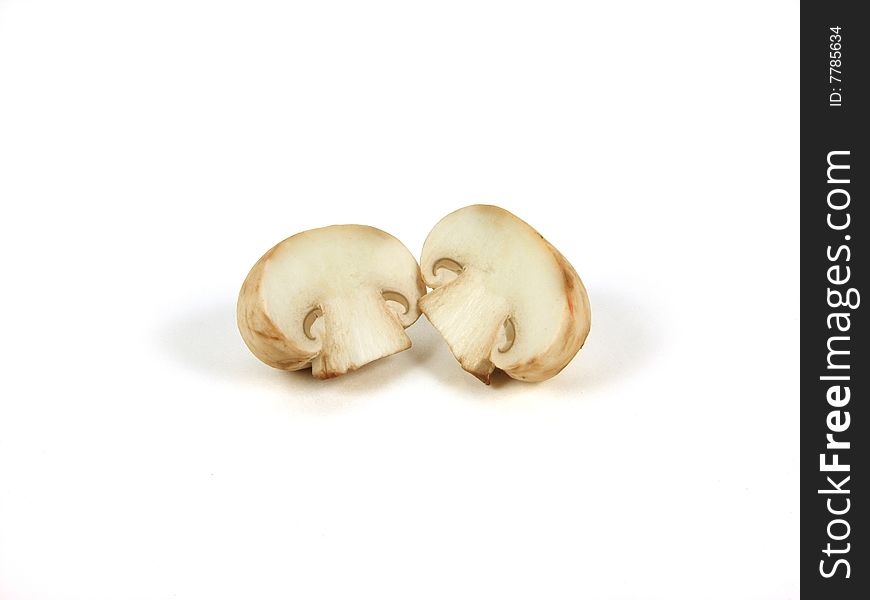 Two halfs of the mushroom on white background. Two halfs of the mushroom on white background