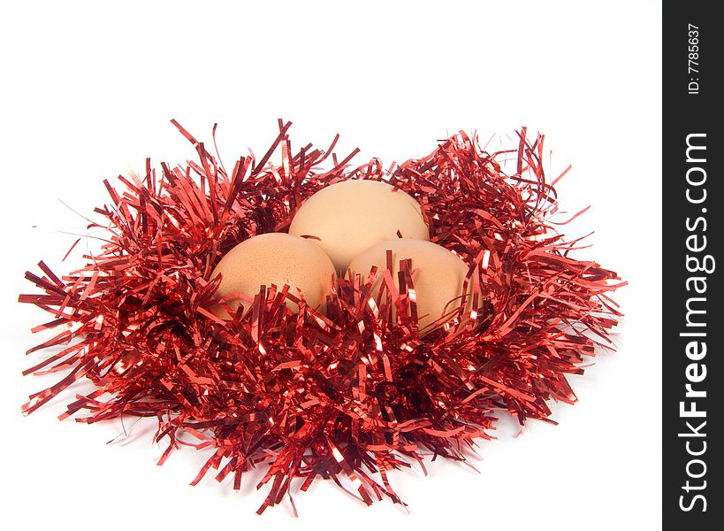 Three eggs in nest from christmas tree ornament