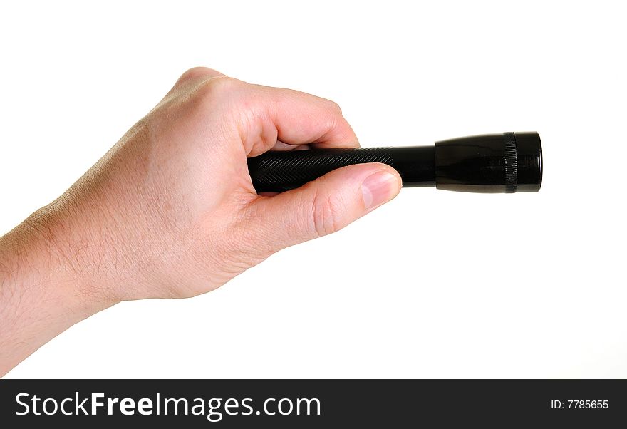 Hand holding small flashlight over white background