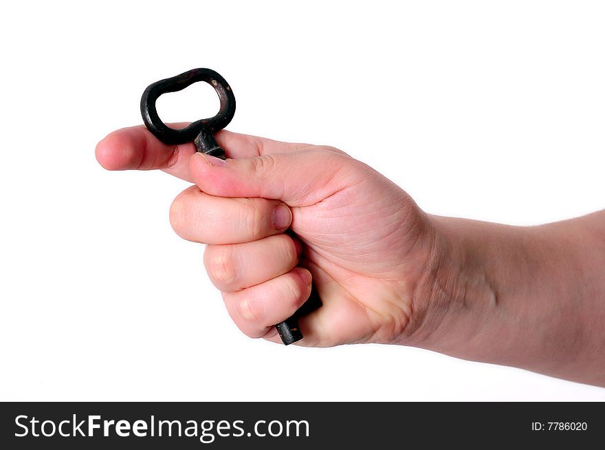 Key in a hand on white background