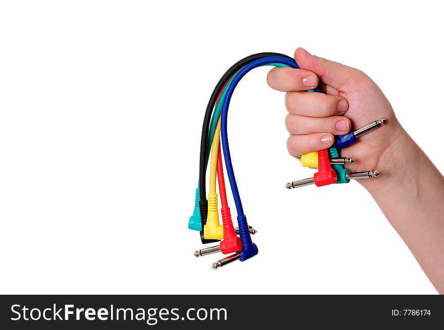 Hands with colored cables over white