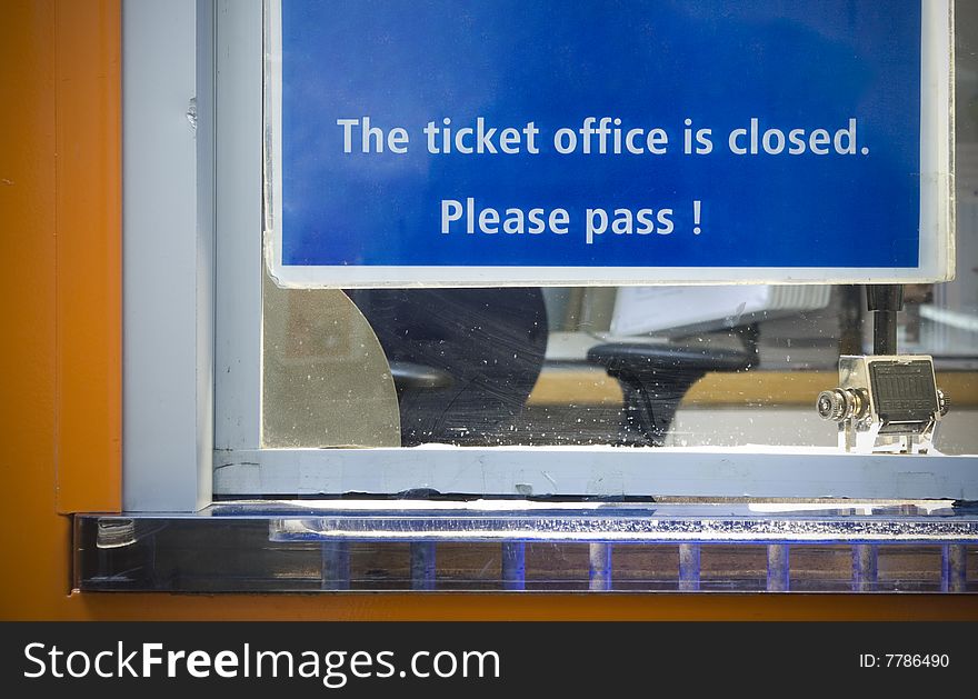 "Closed" sign at a ticket office.