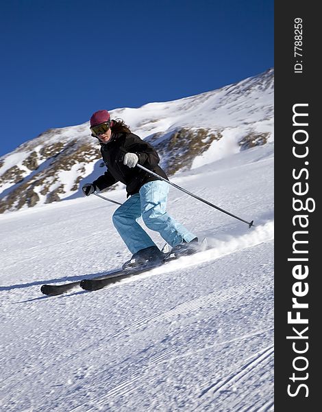 Young woman on the slope of mountain