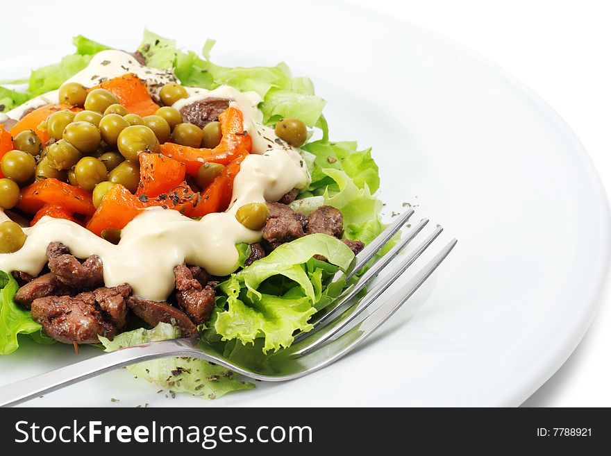 Chicken Salad Composed Chicken Liver and Pepper Dressed with Salad Leaves and Green Peas. Isolated on White Background