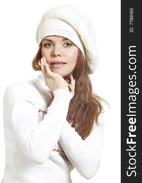 The beautiful young woman in a white winter sweater. The beautiful young woman in a white winter sweater