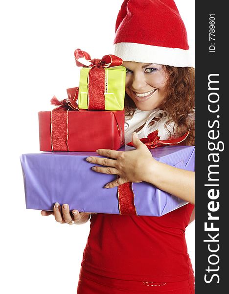 The attractive girl in Christmas with beautiful gifts. The attractive girl in Christmas with beautiful gifts