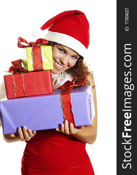 The attractive girl in Christmas with beautiful gifts