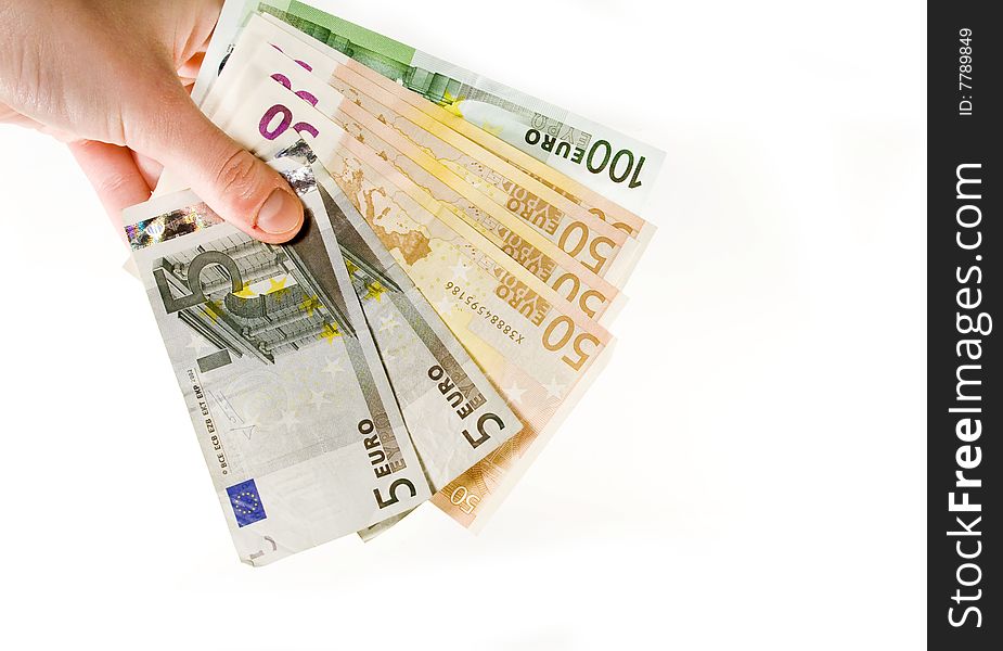 Hand with euro banknotes isolated on white. Hand with euro banknotes isolated on white