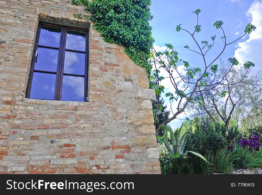 A brick house in a garden