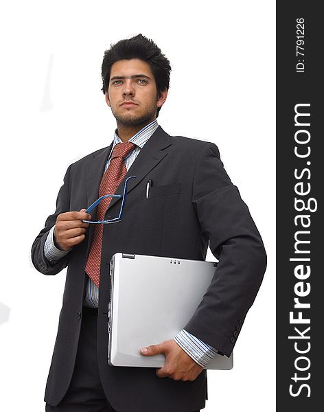 Young businessman with laptop, isolated against a white background