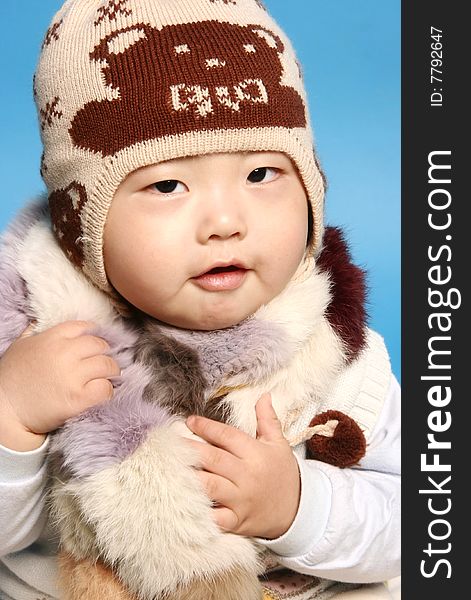 Chinese cute baby boy in winter. Chinese cute baby boy in winter