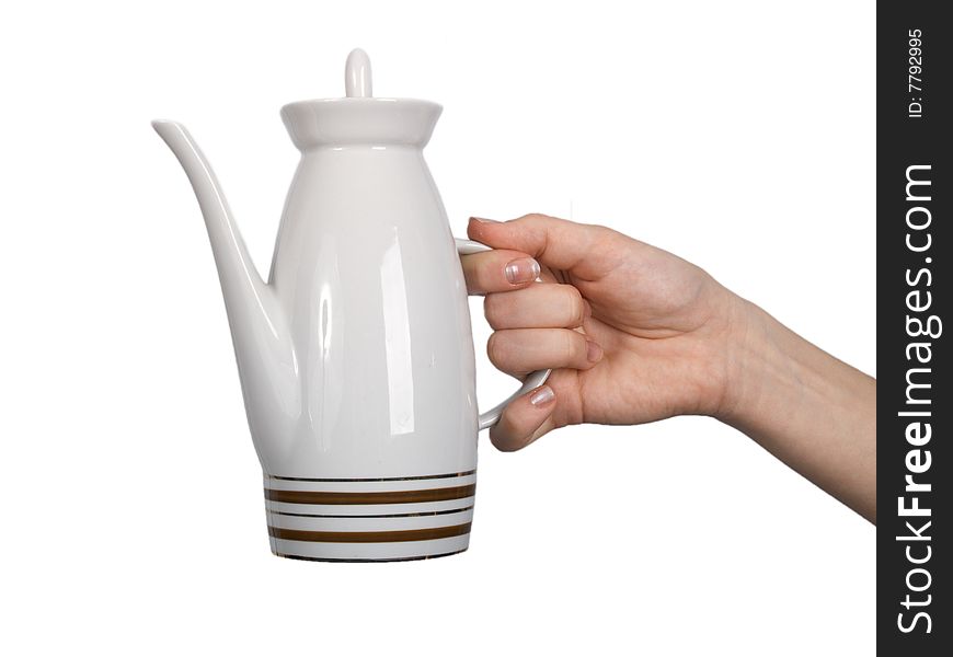 Female Hand Keeps Teapot