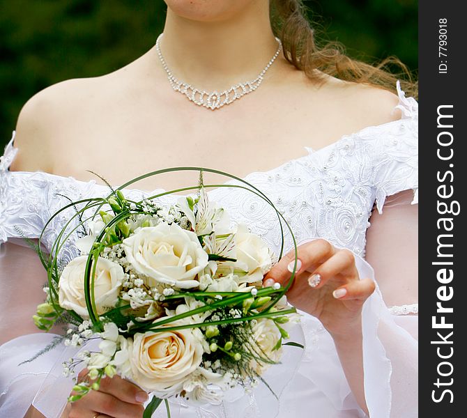 Close up of edding bouquet in bride's hands. Close up of edding bouquet in bride's hands