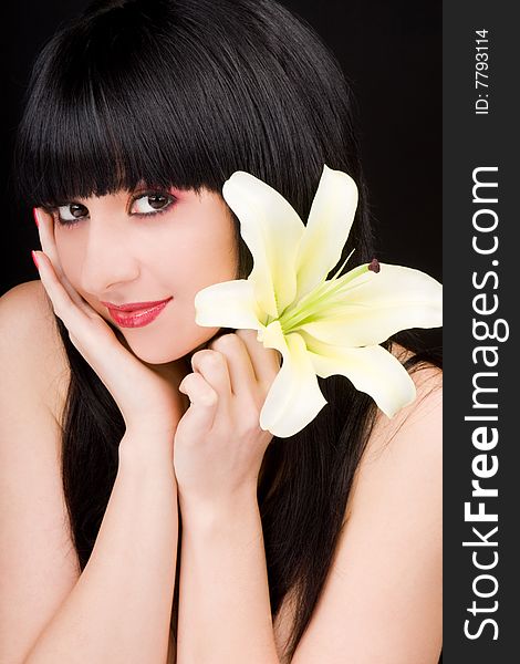 Young woman with lily flower. Young woman with lily flower