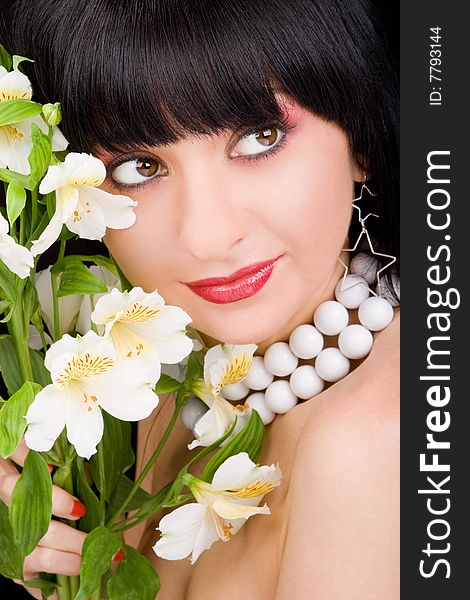 Pretty woman portrait with flowers