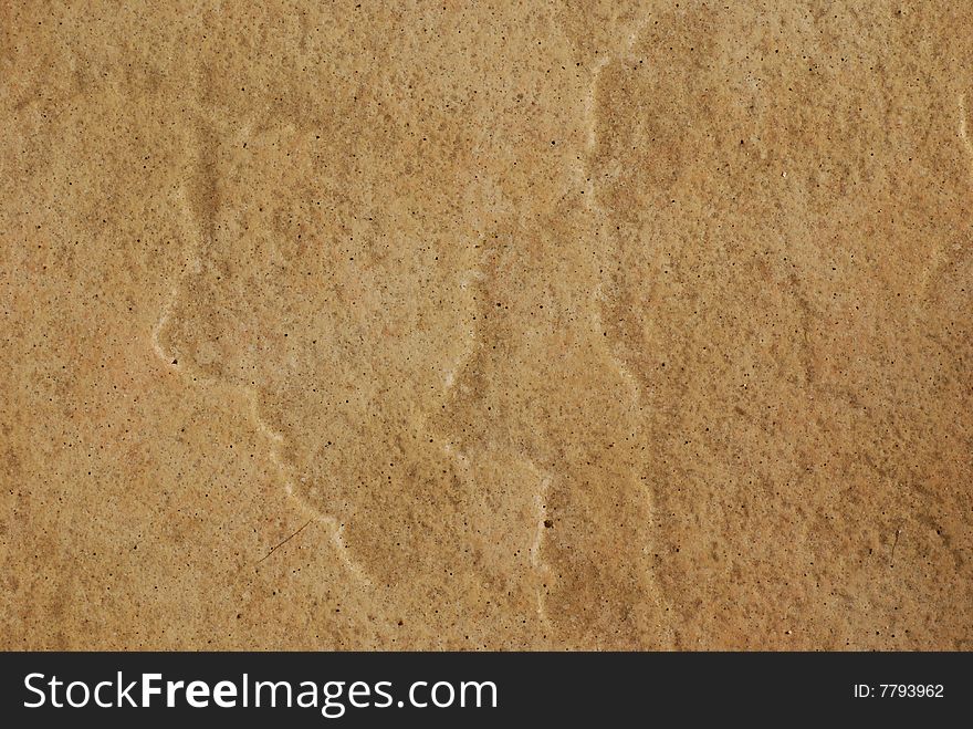 Light brown colored rock as an background picture. Light brown colored rock as an background picture