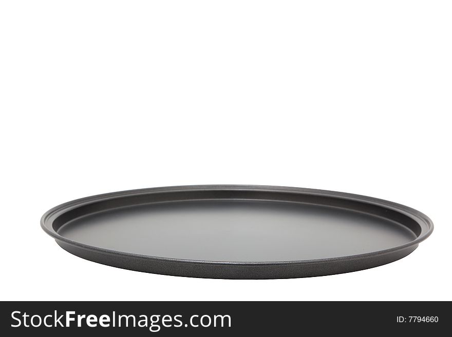 Empty pizza pan over white