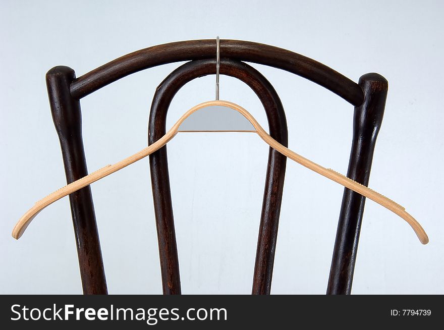 Cloth hanger on old chair