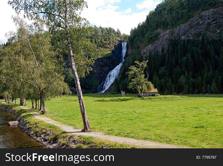 Huldefossen is a waterfall near Moskog at the edge of Gaularfjell, Western Norway. Huldefossen is a waterfall near Moskog at the edge of Gaularfjell, Western Norway.