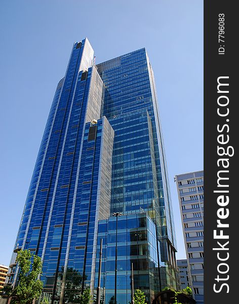 Modern building on the blue sky. Modern building on the blue sky