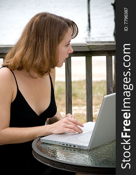 Young Woman With Laptop Computer