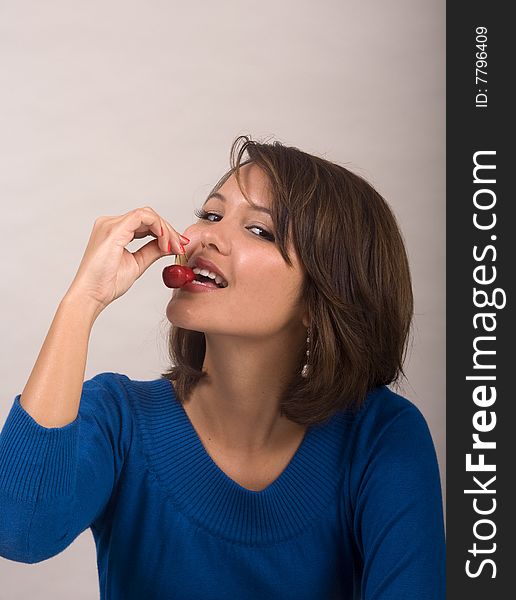 Girl Eating Red Cherries