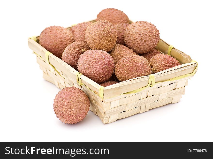 Litchi in the basket on white