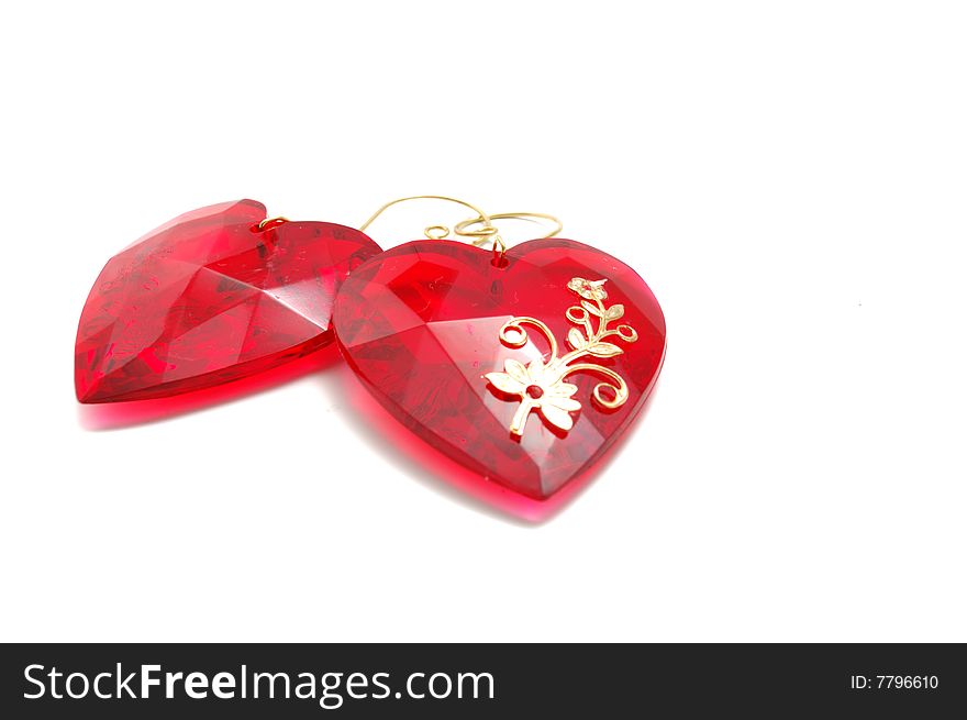 Two connected red glass hearts