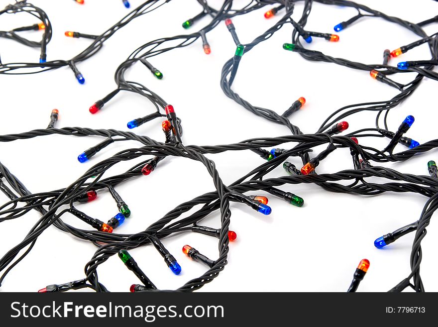 Electric garland colored lamps on white background isolated