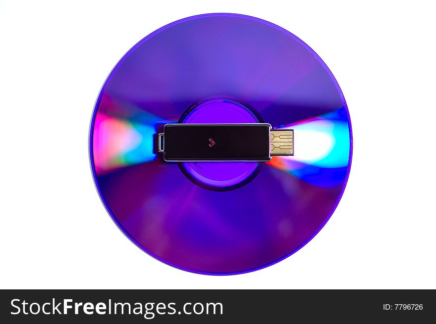 Shiny data storage for tasty content: DVD and flash USB drive isolated