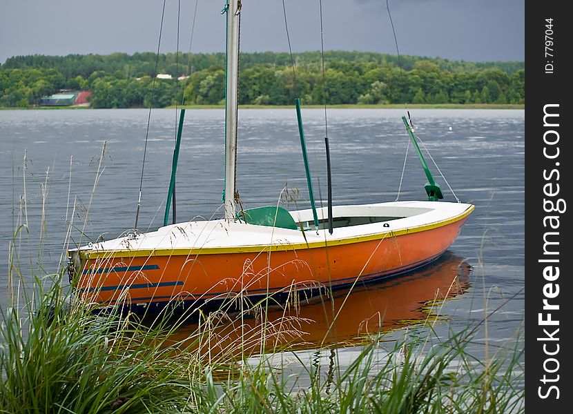 Orange boat on the lake
