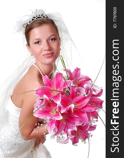 Young bride with bouquet of lilys on a white background