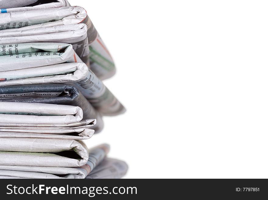 Newspapers stockpile isolated on white.