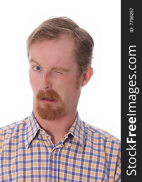 Portrait of winking man on white background