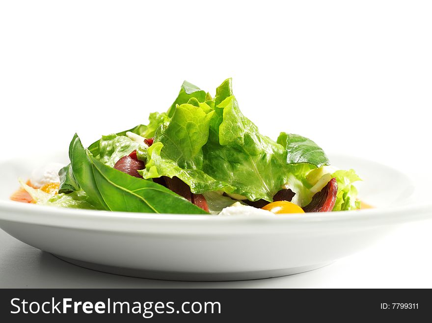 Salad - Smoked Magret (Duck Breast) with Red Chaud-Froid Sauce. Comprises Tomato and Vegetable Leaf. Isolated on White Background. Salad - Smoked Magret (Duck Breast) with Red Chaud-Froid Sauce. Comprises Tomato and Vegetable Leaf. Isolated on White Background