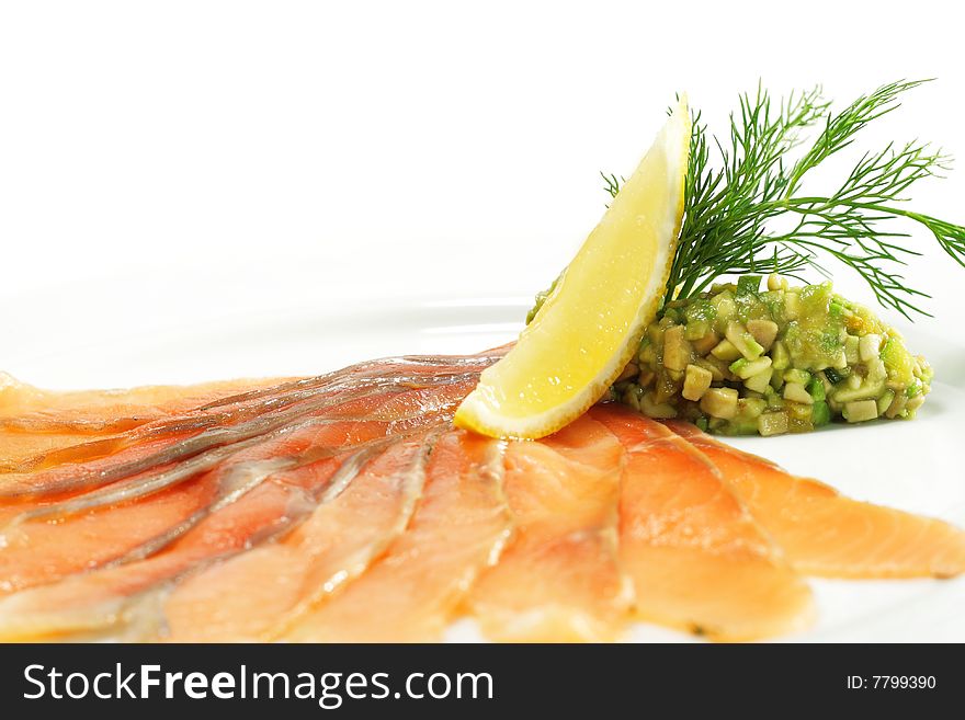 Salt Salmon with Avocado Frappe and Lemon Slice. Isolated on White Background