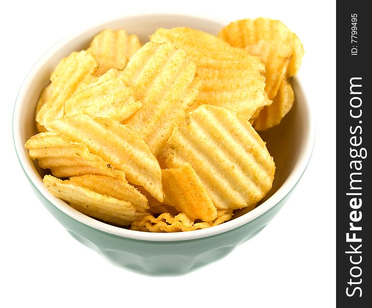 A bowl full of potato chips. A bowl full of potato chips
