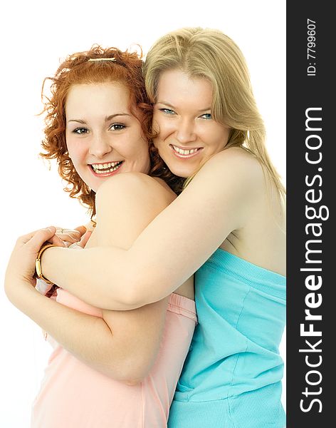 Portrait of two happy embracing and laughing friends against white background. Portrait of two happy embracing and laughing friends against white background