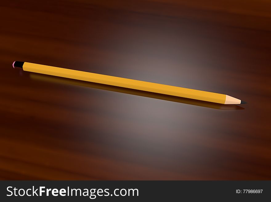 A yellow pencil on a wooden table/desk top.