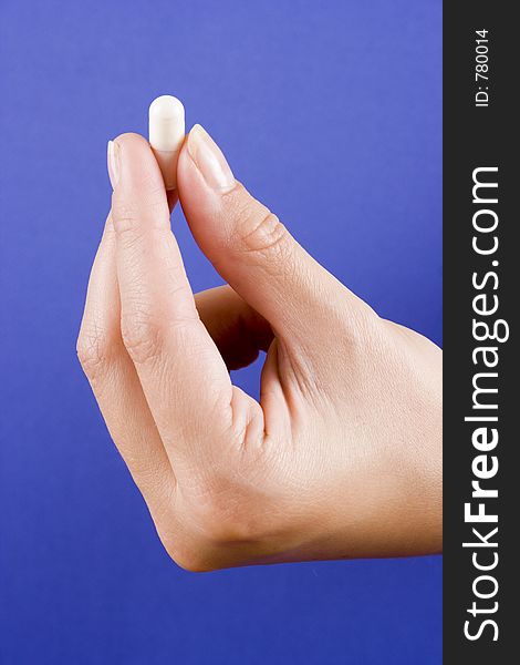 Pill In A Fingers