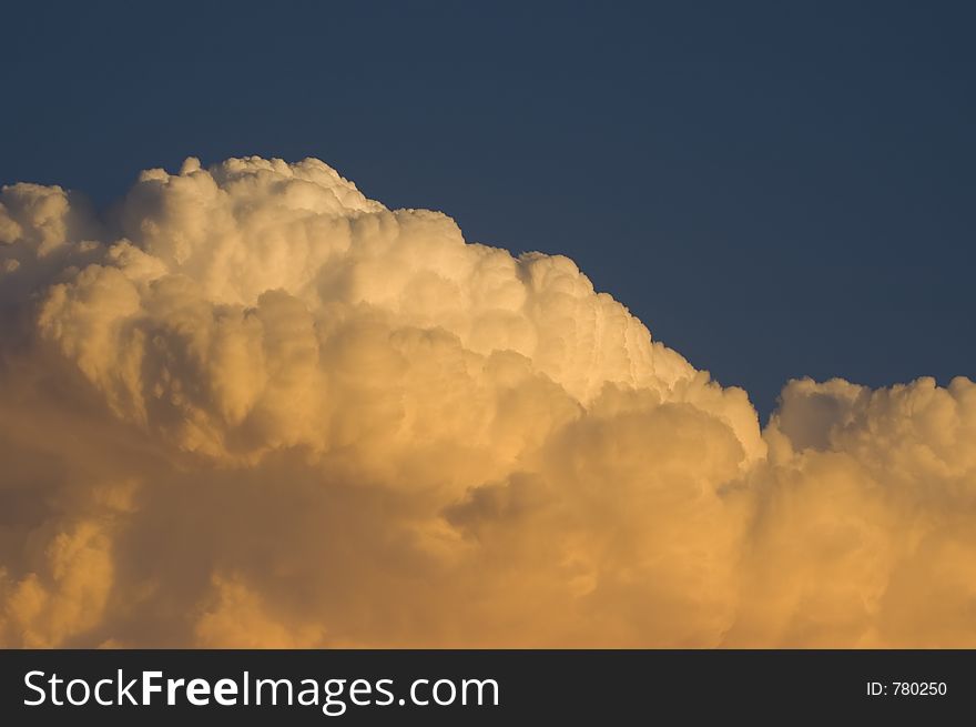 Thunderstorm moving in at sunset