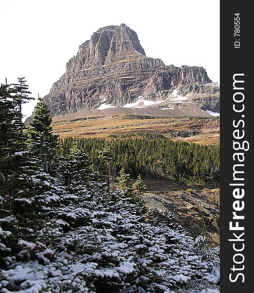 This picture shows Clements Mountain in Glacier National Park after a light fall snow.